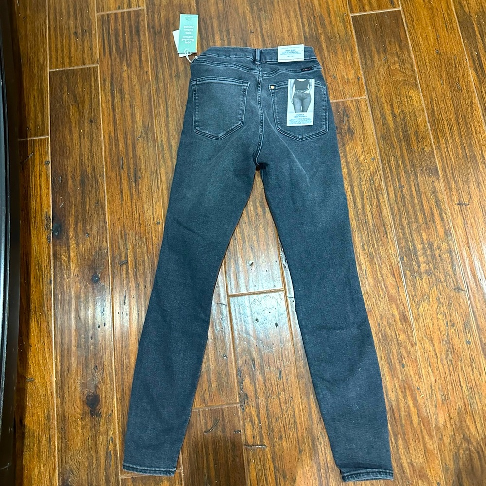 Skinny mid-rise, distressed jeans